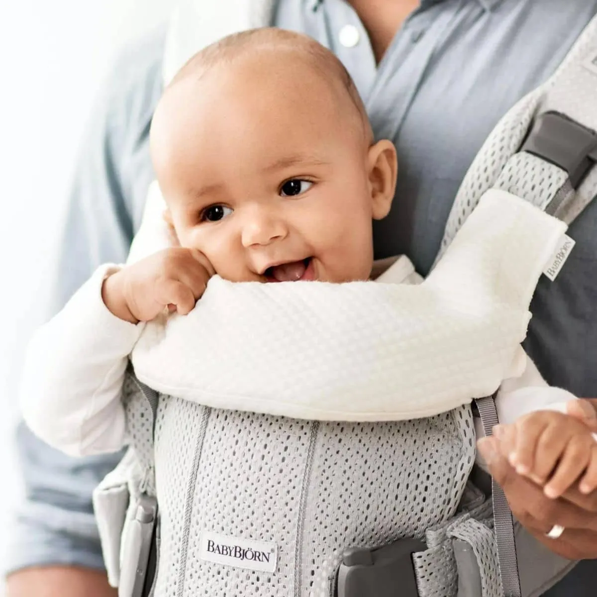 Certainly! Heres an optimized product title with modifiers:  

Convertible BabyBjorn Teething Bib for Baby Carrier One - Durable, Soft, and Absorbent Protection