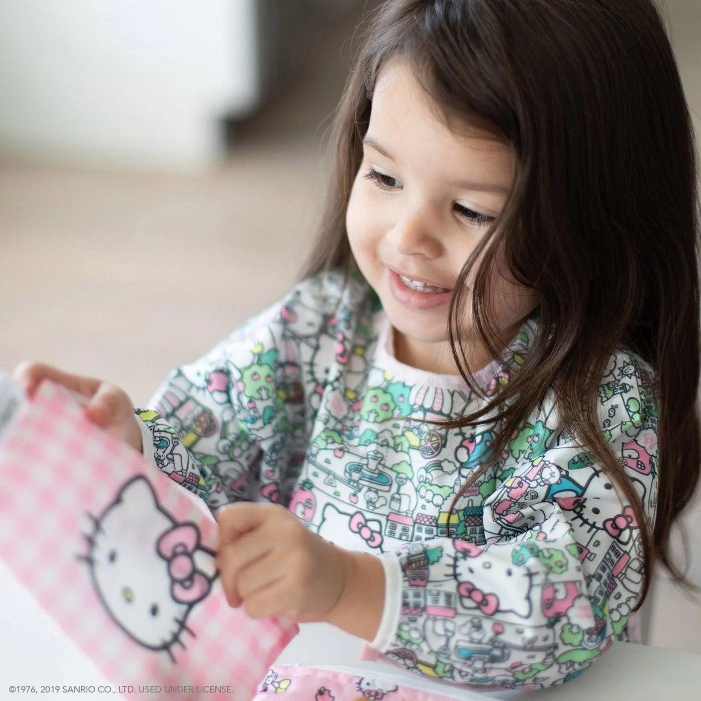 Bumkins Hello Kitty® - Sleeved Bib - Hello Kitty Carnival